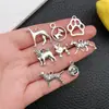 1 Nuevo Modelo de Aleación de Plata Antigua Serie Animal Perro Colgante Encanto Pulsera DIY Collar Llavero Accesorio de Joyería