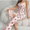 Europa y Estados Unidos transfronterizo nuevo sexy malla costura impresa pijama dos piezas mujeres ropa de casa traje al por mayor