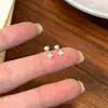 Pendientes de Estrella de Cuatro Puntas de Plata Pura S999 Estilo Coreano Minimalista Estilo Fresco Estrella Exquisitos Moda Versátiles Pendientes de Diseño para el Viaje