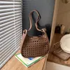 Moderna Bolso Cubo Grande Nuevo para Mujer 2026 Estilo Coreano Hueco Bolso de Hombro Único Versátil Bolso Cruzado para el Viaje Diario