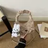 Nova bolsa balde retrô minimalista, bolsa casual fashion, bolsa de ombro e transversal feminina texturizada nova do outono de 2026