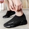 Novos sapatos femininos de meia-calça primavera-verão, calçados de caminhada ocos, calçados casuais de malha, calçados preguiçosos da moda, tênis ocos