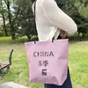 Bolsas no tejidas personalizadas para publicidad, compras, regalos, textiles para el hogar, ropa de mujer, ropa de niño, ropa de hombre y bolsas de embalaje con cordón y broche a presión para tiendas de ropa