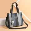 Bolso de mujer nuevo 2024 bolso de hombro de moda bolso cruzado bolso de lona bolso de mano de color contrastante bolso tote simple combinable