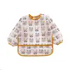 Bata de Alimentación Impermeable de Manga Larga Reversible para Bebés y Niños 2026 con Bandeja para Comida
