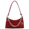 Bolsa de mano tipo dumpling de alta calidad al por mayor para mujer, nuevo modelo otoño 2026, bolso de hombro de color liso con patrón de cocodrilo, bolso de axila de moda