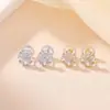 Yi Lu Yin Plata de Ley S925 Chapada en Oro Estilo Coreano Moda Flor Brillante Superficie Brillante Pequeño Fresco Simple Para el Trabajo Temperamento Aretes de Botón Adornos para Orejas