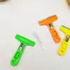 Pala de limpieza al por mayor para suelo para quitar suciedad de vidrio de pared pala de limpieza portátil nueva cuchillo mango de color paleta