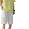 Shorts Esportivos de Seda Gelada Soltos Novos para Verão Masculino Tendência Secagem Rápida com Etiqueta de Couro, Shorts de Praia Respiráveis