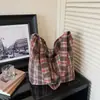 Bolsa Balde de Lã Versátil Xadrez Pied-de-poule Retrô para Mulheres 2026 Novo Estilo Artístico Casual com Textura para Ombro e Transversal