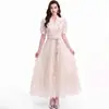 Fornecimento em primeira mão de lote misto: Elegante vestido longo cor de damasco com gola alta, bordado, efeito emagrecedor e barra larga, adequado para pedidos transfronteiriços
