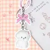 Figura de dibujos animados popular de peluche de cachorro, perro de caramelo, llavero, accesorio creativo para bolsos y decoraciones de niñas