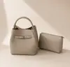 Bolsa tote tipo cubo con estampado de lichi para mujer, nueva tendencia de moda 2026, elegante, de alta calidad, simple, casual, bolso de hombro, bolso cruzado