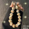 Cordão para Celular de Lã com Estampa de Leopardo Transfronteiriço Corrente de Celular com Bola de Pelo de Inverno Corrente Curta de Cristal Pendente Chaveiro de Pulso Anti-Perda