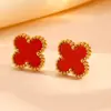 Moda transfronteriza acero inoxidable flor de tres cuatro hojas joyería Europa y Estados Unidos nuevo acero de titanio no se decolora traje de joyería de flor pequeña