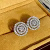 Pendientes redondos multicapa con incrustaciones de diamantes estilo europeo y americano de Cao Shi, pendientes de nicho de lujo ligero de alta gama, accesorios para orejas versátiles y elegantes