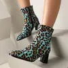 Novas botas femininas britânicas outono e inverno 2024 estampa de leopardo botas curtas estilo martin botas de salto alto grossas 40-44 tamanho grande botas de comércio exterior