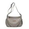 2026 Nova Moda Versátil Bolsa de Ombro Cruzada para Mulheres Grande Capacidade para o Dia a Dia Couro Macio Bolsa Bolinho Simples Toque de Luxo