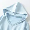 Venta al por mayor de ropa de mujer de moda estilo europeo y americano, incluyendo conjuntos de sudaderas ajustadas con cuello en V casuales estilo americano y pantalones de chándal con cordón