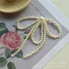Zhong Chuxi con pendientes de lazo de perlas dulces retro accesorios pendientes hechos a mano diy tocado venta al por mayor