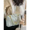 Bolso de cadena transfronterizo de nicho con patrón de diamante para mujer, nuevo bolso de mano versátil versión coreana para la primavera de 2026, bolso de hombro y cruzado