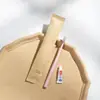 Traje de artículos de tocador desechables para hotel bolsa de papel Kraft para hotel juego de cepillo de dientes dos en uno cepillo de dientes de hospitalidad para el hogar
