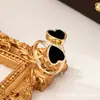 Nuevo diseño de anillo con incrustaciones de amor acrílico metálico tridimensional europeo y americano, exquisitos accesorios de joyería de amor para mujer