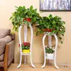 Suporte de Flores de Ferro Forjado Estilo Europeu, Espessado Multicamadas Sala de Estar Varanda de Chão para Interior Rabanete Verde Suporte para Vasos de Flores Pendurados Atacado