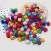 Venta al por mayor del fabricante Hecho a mano diy Bola de Pelo con Purpurina Polipropileno Mixto Coloridos Accesorios para Ropa Suministro en Stock