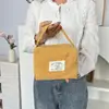 Bolsa de Mão de Veludo Cotelê Estilo Coreano, Simples, Leve, Bolsa de Cosméticos Portátil de Grande Capacidade, Bolsa Pequena de Lona de Mão Tendência e Fashion