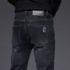 Jeans skinny ajustados de alta gama para hombre en negro y gris de Hong Kong, estilo delgado de verano 2026 con estampado en el bolsillo