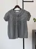 Cardigan de punto de manga corta con flores tridimensionales, nuevo estilo para principios de otoño de 2026, suéter de outer wear de estilo coreano suelto en capas para mujer