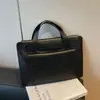 Bolso Grande de Mujer Estilo Coreano Transfronterizo de Nicho 2025 Nueva Moda Versátil Bolso de Oficina Bolso de Mano Simple de Gama Alta