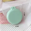 Nuevo peine de airbag de macarrón, color sólido, portátil con espejo, peine de masaje para niñas, peine plegable de color caramelo para peinar