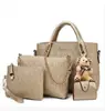 Bolso de mano para mujer verano nuevo conjunto de cuatro piezas bolso de madre bolso de hombro de oso bolso de mujer primera generación de pelo