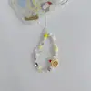 Venta al por mayor del fabricante Nuevo modelo Gato Kt Lazo Cadena para teléfono Colgante de cadena para teléfono con cuentas hecho a mano Decoración para niñas