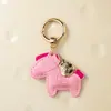 Llénalo Pronto Llavero de Pony Colgante de Dibujos Animados de Cuero Accesorio para Bolso de Mujer Colgante Pequeño del Año del Caballo En Stock