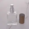 Venta al por mayor de fábrica 15 ml Decantador de perfume simple Tapa de madera maciza Portátil Atomizador de niebla fina Botella de vidrio vacía Botella de perfume de viaje