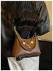 Bolso Tote para Viajar Mujer 2026 Nuevo Estilo de Moda Otoño Invierno Súper Caliente Bolso de Hombro Único Debajo del Brazo Gran Capacidad Bolso Cruzado con Cadena