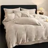 Conjunto de quatro peças de luxo leve de veludo de leite, espessado para o inverno, flanela, capa de edredom de veludo coral, lençol de cama, roupa de cama de inverno