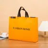 Bolsa de mano de tela no tejida, moderna y sencilla, para compras, regalos, protección del medio ambiente, capacitación, promoción, publicidad, engrosada, con impresión de logotipo, al por mayor
