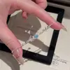 Pulsera de circonia con forma de estrella y luna estilo coreano inspirada en Instagram, pulsera de nicho de lujo ligero de alta gama, joyería exquisita, moderna y versátil