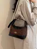 Bolsa Vintage de Camurça de Nicho para Mulheres 2026 Novo Modelo Padrão de Diamante Versátil Bolsa Transversal Color-Block da Moda Bolsa de Ombro Único Sob o Braço