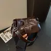 Bolso bandolera casual de diseño de nicho, bolso nuevo moderno y a la moda, bolso cuadrado pequeño único para mujer de invierno 2026