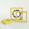 Caja de Suspensión Pe Film Spot Transfronteriza con Base Caja de Exhibición de Joyería y Juguetes Caja de Almacenamiento de Joyería Portátil y Duradera
