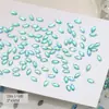 Explosiones de网红 azul pavo real joyería para uñas plana súper brillante gotas de agua ojo de caballo hoja de arce taladro de uñas mixto venta al por mayor