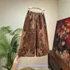 [Li] Nuevos pantalones acampanados cortos estilo chino, estilo nacional, jacquard de terciopelo, nueva colección otoño 2026, pantalones elásticos de cintura alta
