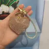 Llavero de Corazón Full Diamante Estilo Chanel Colgante de Corazón para Pareja Llavero para Bolso Coche Regalo Personalizado Llavero