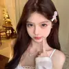 Pinza para el Cabello Rosa Dulce y Femenina con Lazo y Perla, Suave y Lujosa, Exquisito Accesorio Pequeño para Flequillo Lateral