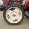 Tractor Pequeño de Cuatro Ruedas Monocilíndrico de 25 Caballos de Fuerza con Llantas Agrícolas para Trasplante en Invernadero, Aspersión y Rotocultivo, con Distancia entre Ejes Alta que No Aplasta las Plantas
